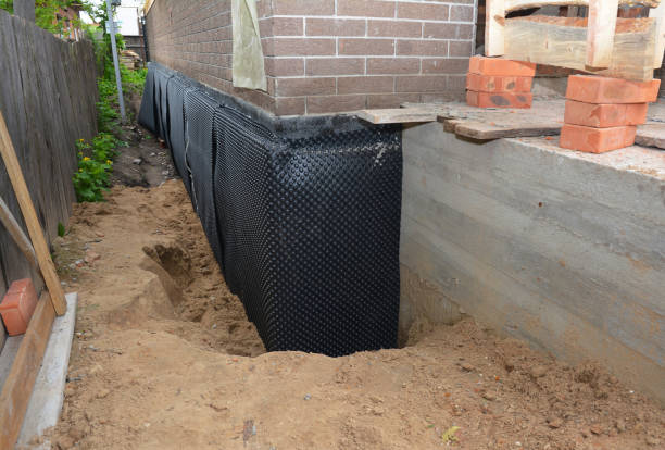 SJ Waterproofing Pros technician performing targeted Vapor Barrier Installation assessment in Kirkersville, OH
